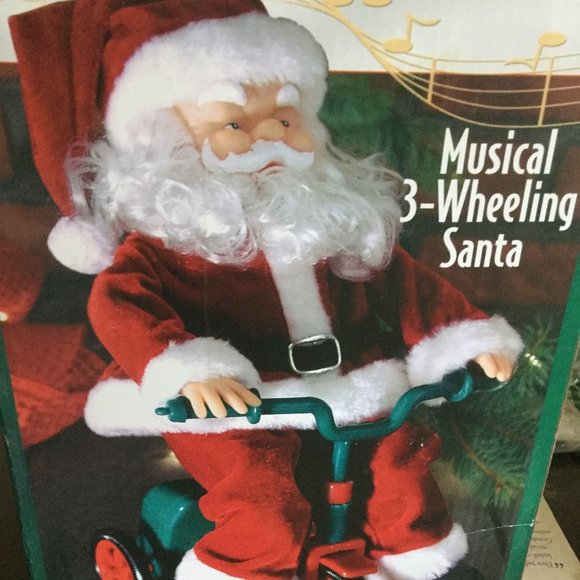 Musical 3 Wheeling Santa plays 3 songs while he travels around on his tricycle - Picture 1 of 6